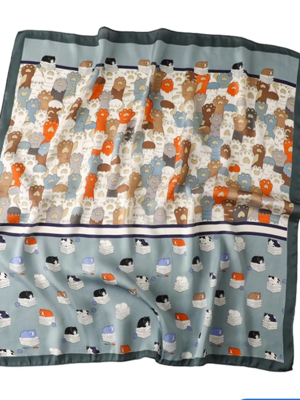 Playful Cat Paw Scarf in Orange & Navy feels like silk is polyester